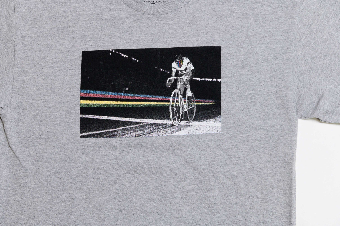 LCCC Il Campionissimo gray tee, close-up front view with vintage cycling-inspired print