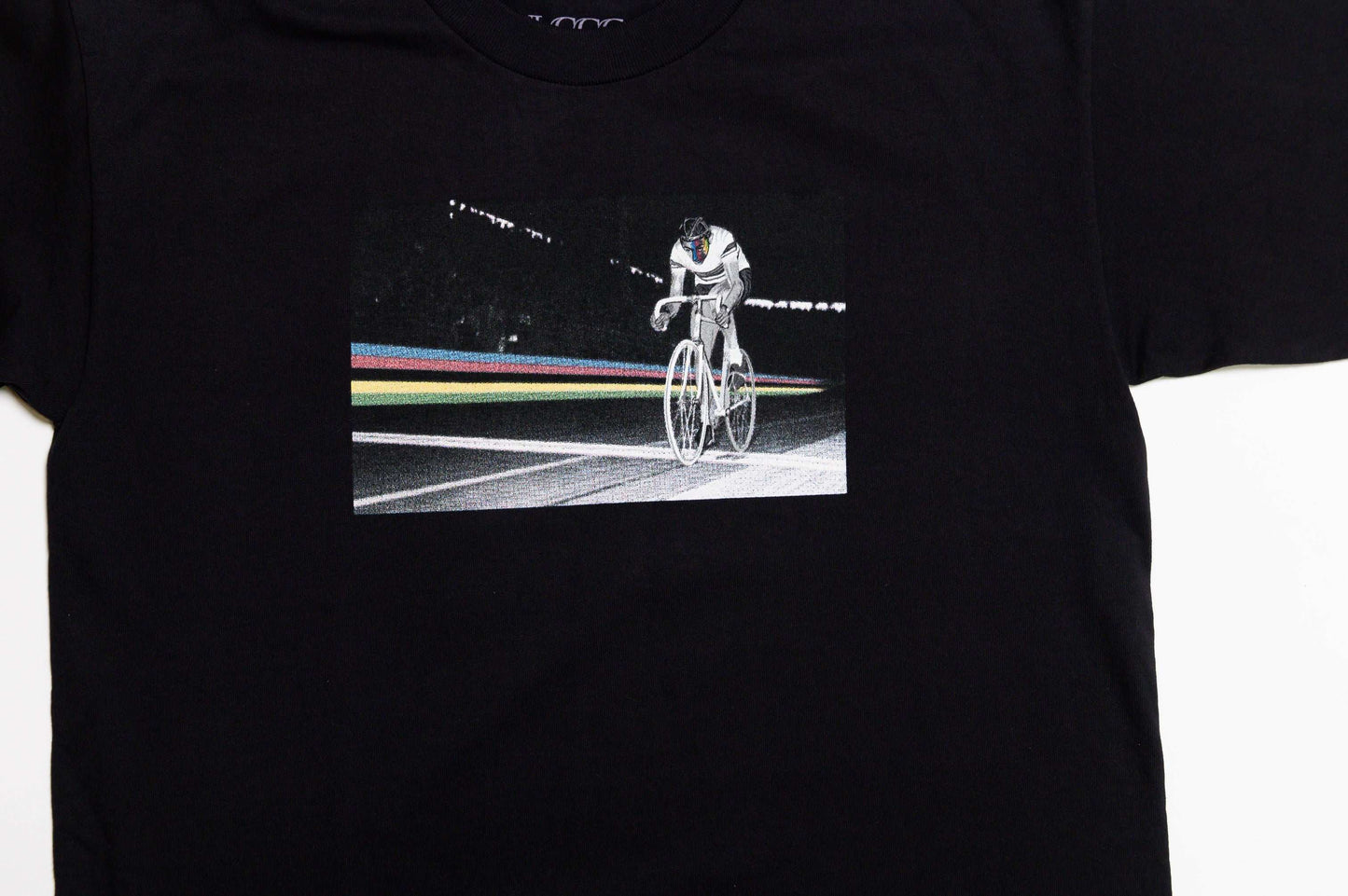 Close-up of front graphic print and soft texture on Il Campionissimo tee by LCCC
