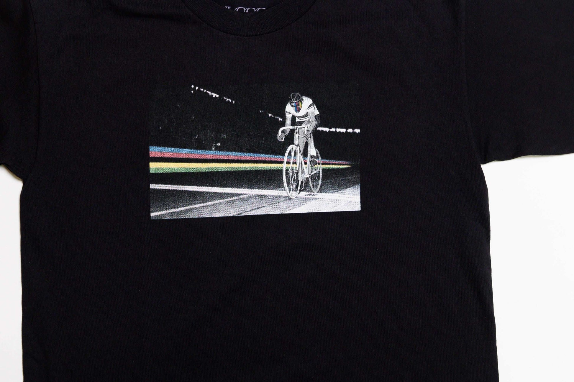 Close-up of front graphic print and soft texture on Il Campionissimo tee by LCCC
