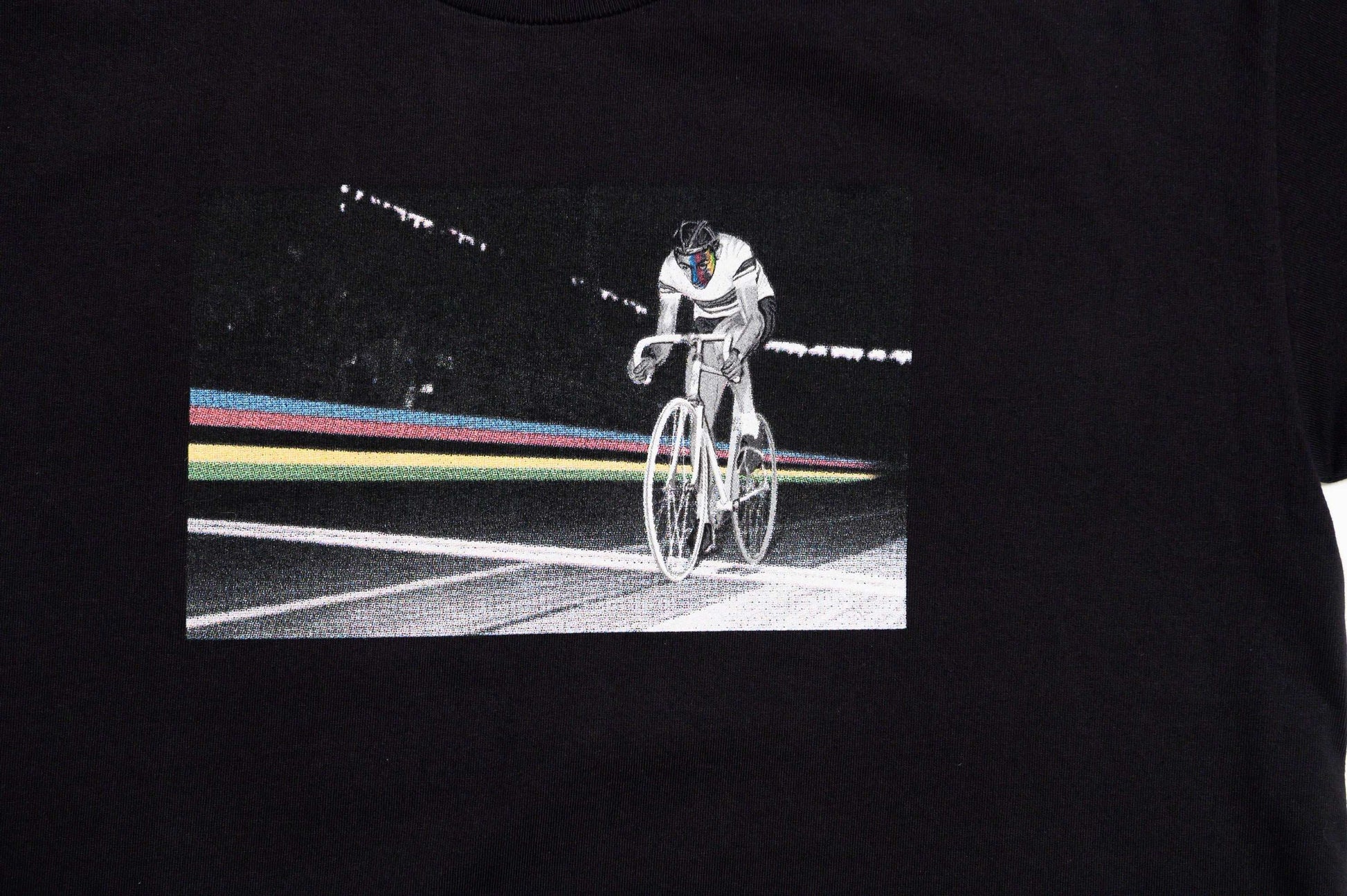 Zoomed-in-close-up of front graphic print and soft texture on Il Campionissimo tee by LCCC