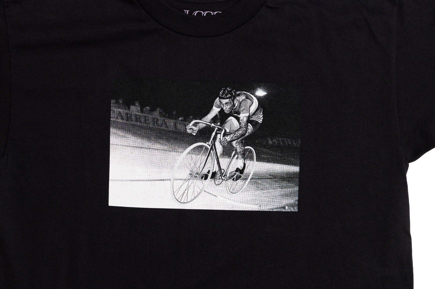Zoom close-up of Monsieur Chrono print detail on charcoal grey tee by LCCC
