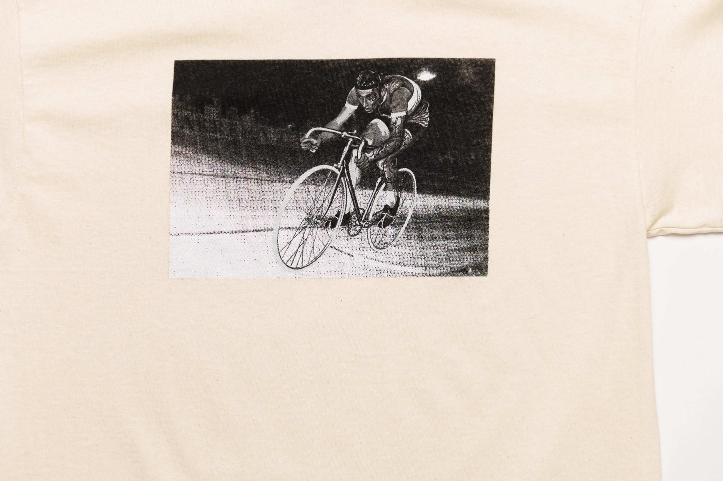 Zoom close-up of Monsieur Chrono print detail on white/oatmeal tee by LCCC