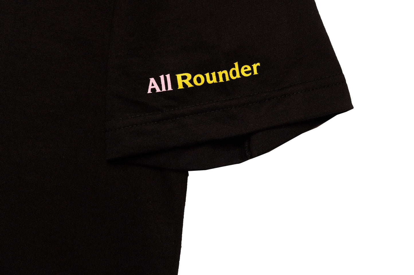 Folded view of The Cannibal black tee by LCCC showing sleeve graphic and fabric 