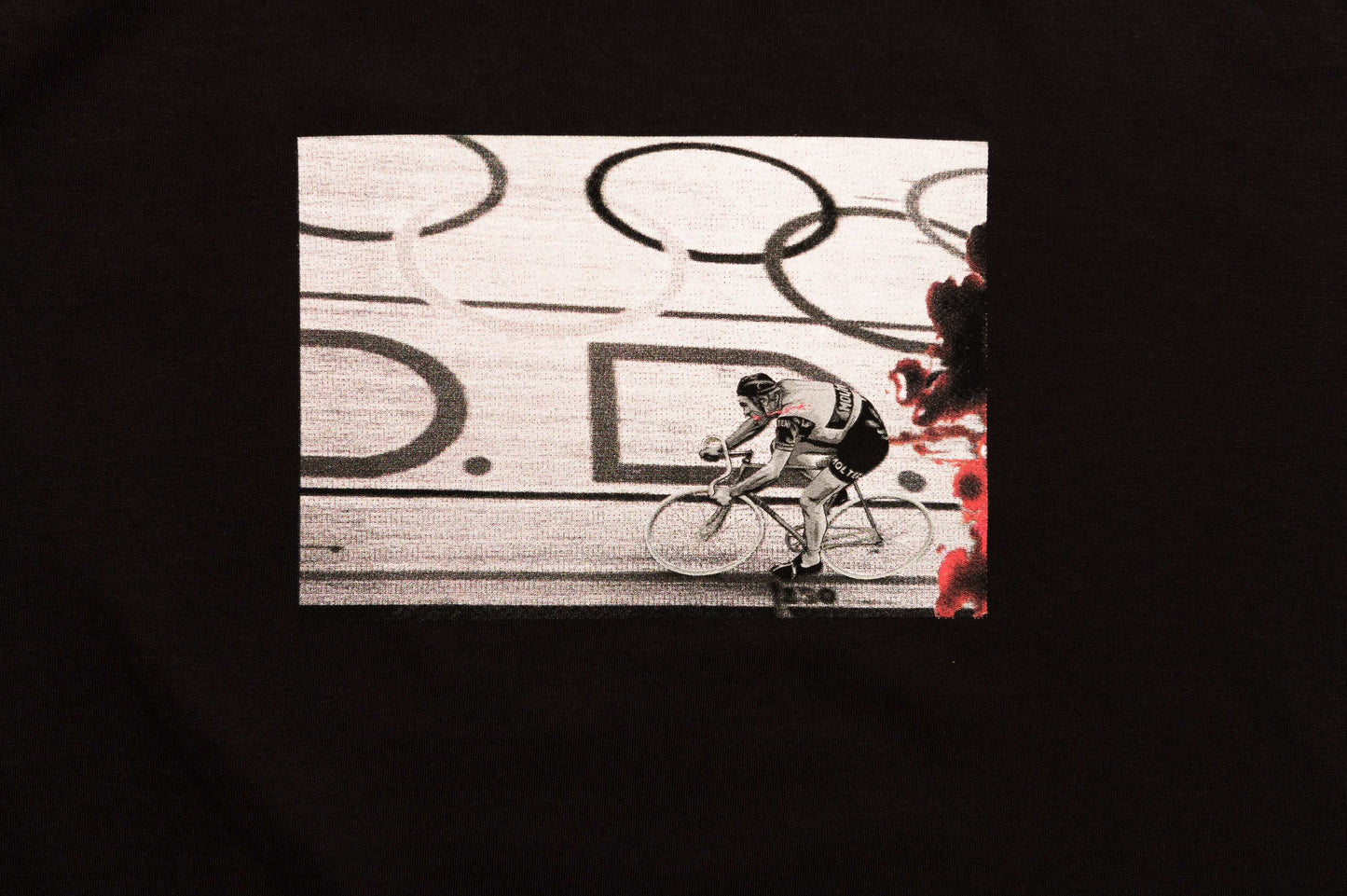 Zoom close-up of The Cannibal print design on LCCC black tee