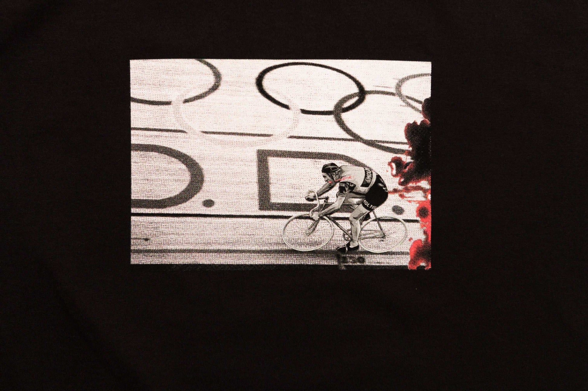 Zoom close-up of The Cannibal print design on LCCC black tee